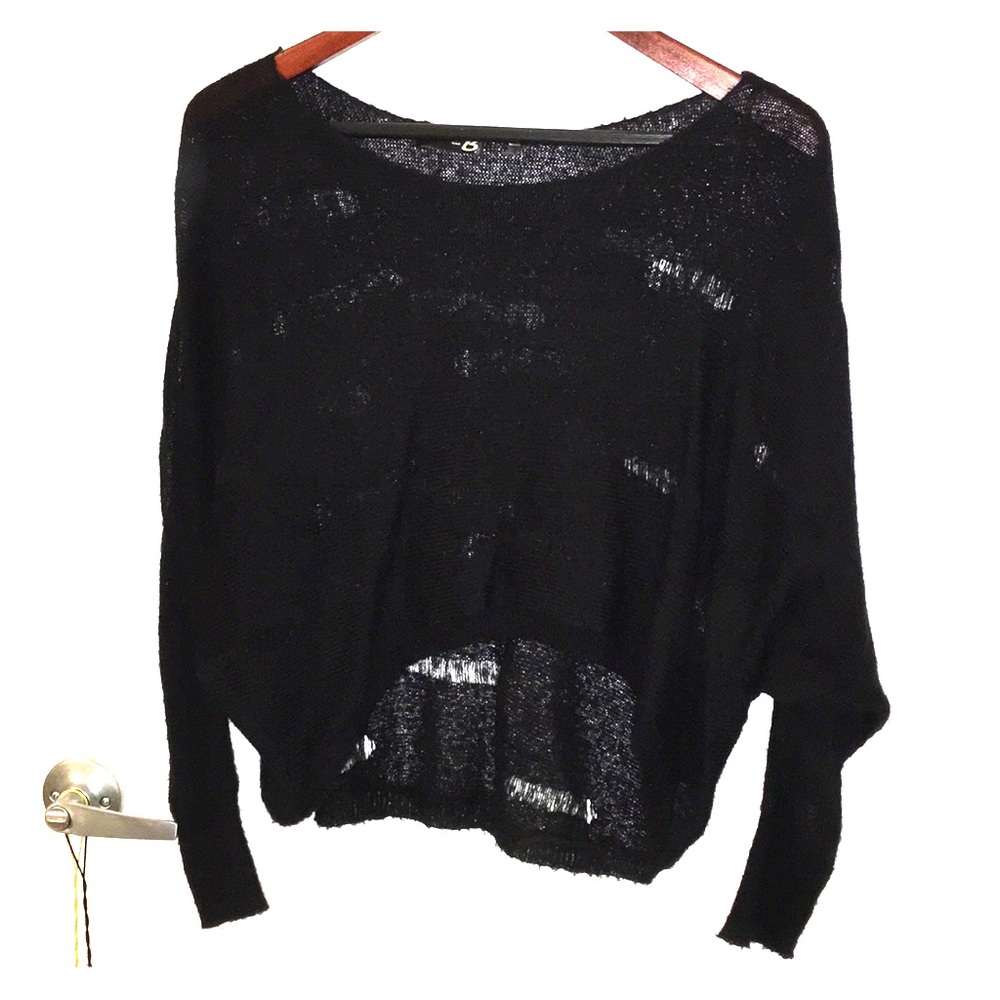 Black top with hole patterns